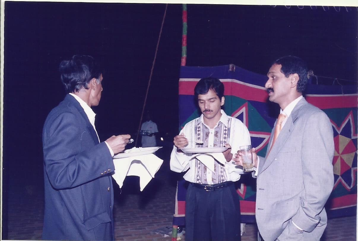 Members tasting coffee at an evening event