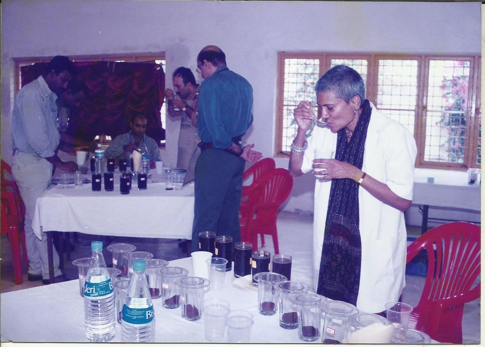 Members tasting coffee at a cupping session