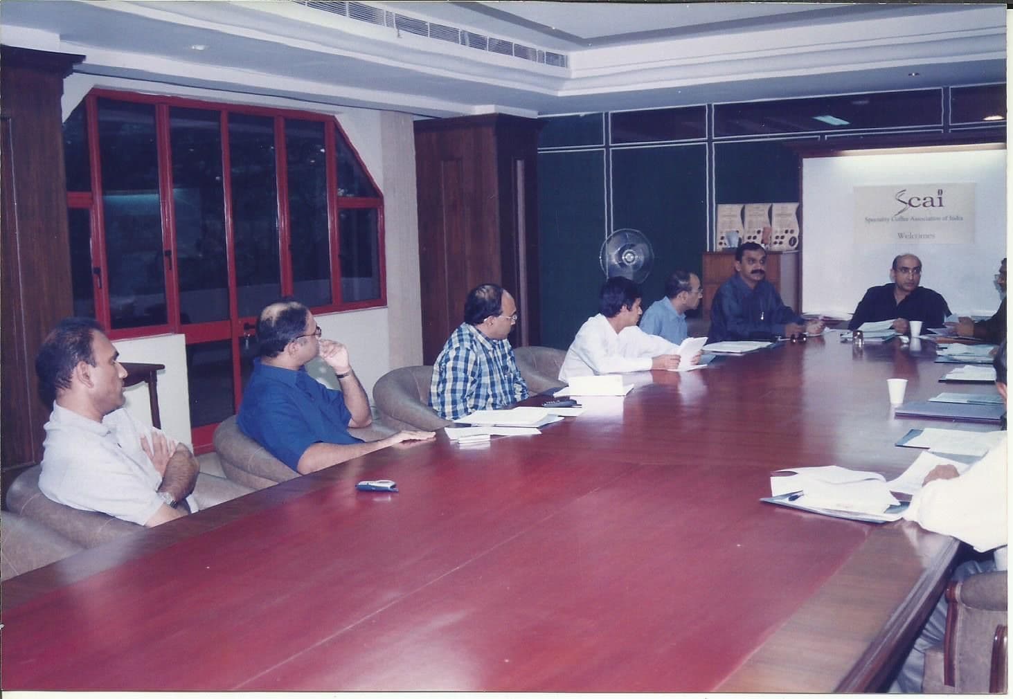 Members in a boardroom meeting