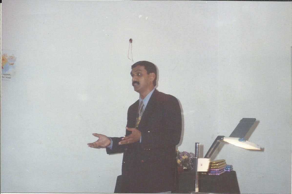 Presenter speaking at a session