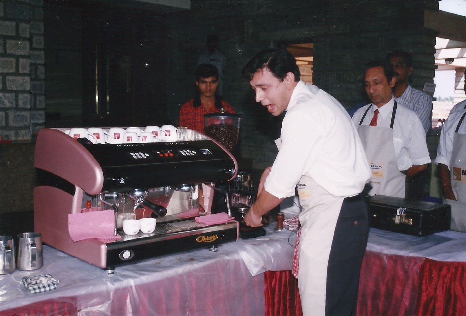 Barista at an espresso machine, India Barista Championship 2004