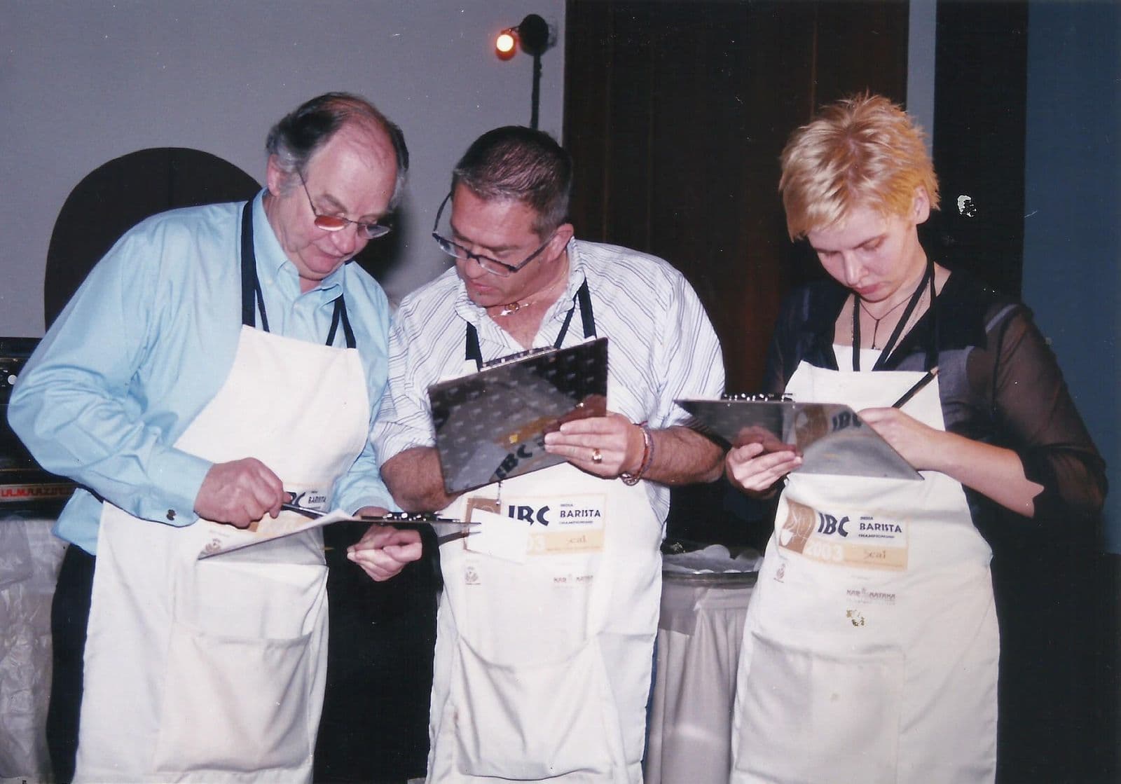 Judges reviewing score sheets at the championship