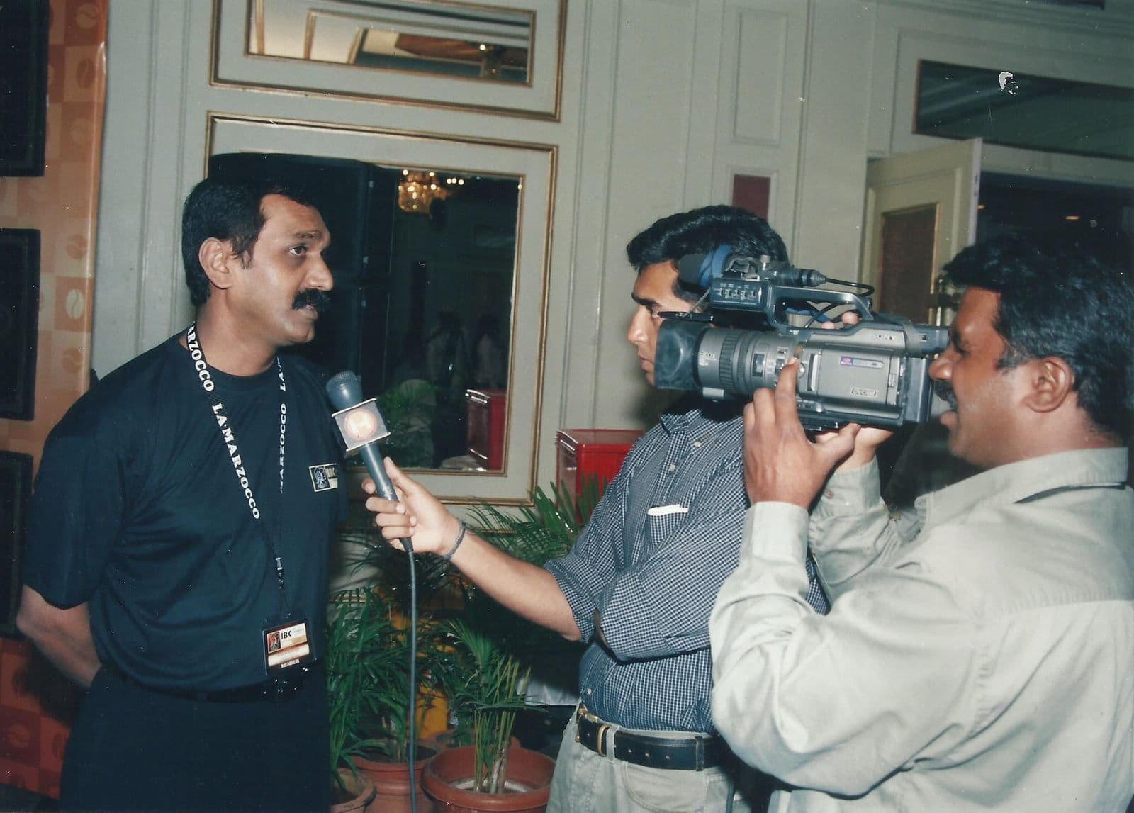 A member interviewed by a TV crew at the championship