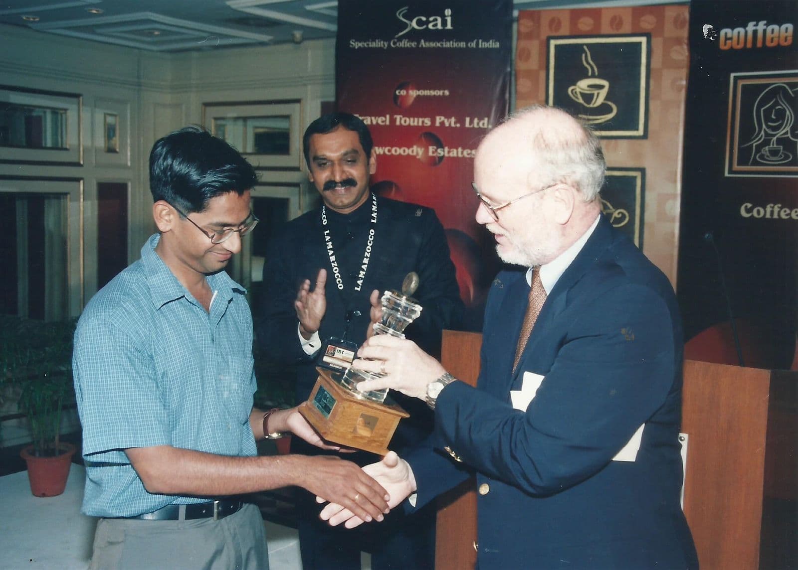 A winner receiving a trophy at the championship